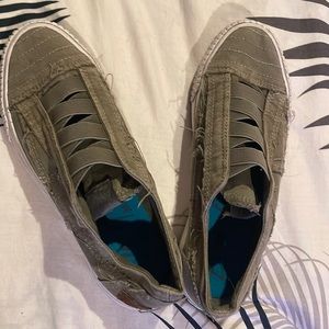 Distressed Army green slip on sneakers